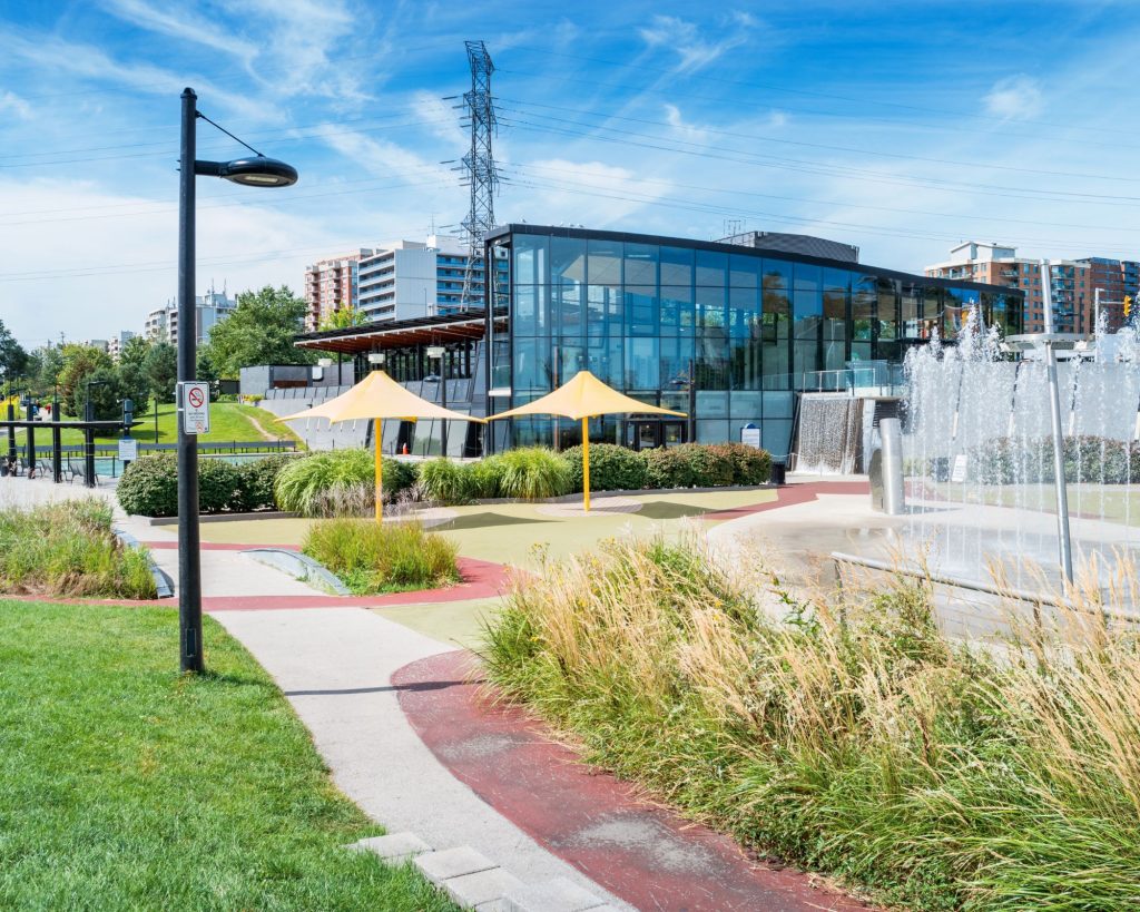 View of Spencer Smith Park in Burlington, Ontario, showcasing pathways, trees, and recreational areas.
